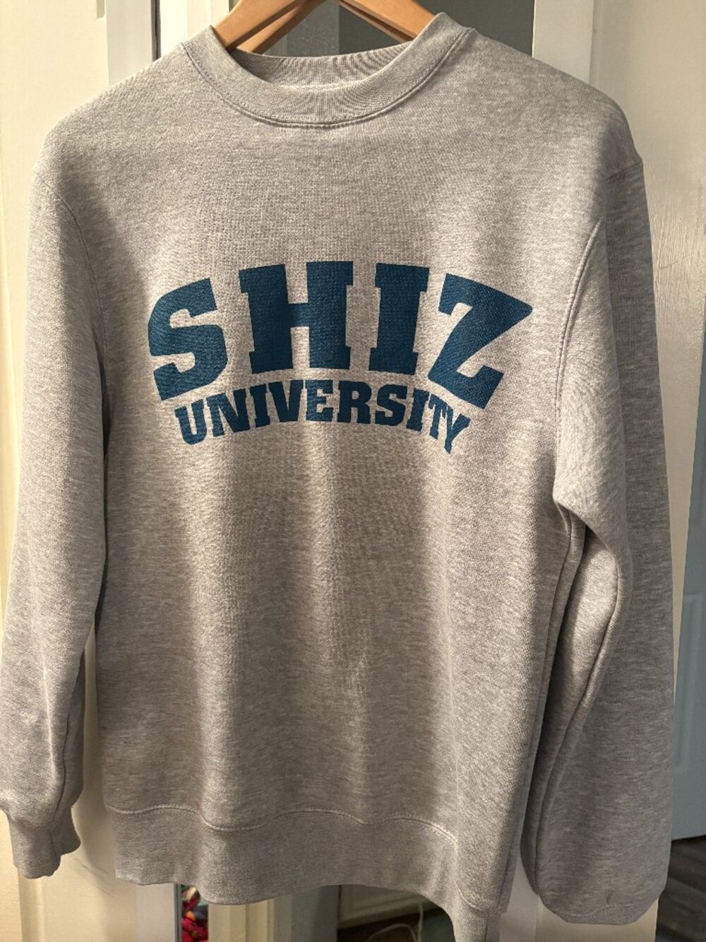 WICKED SHIZ UNIVERSITY SWEATSHIRT